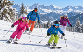 Famille au ski à Noel